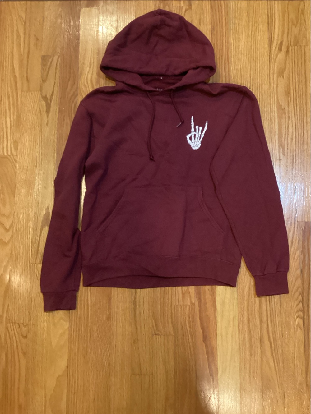 Burgundy Hoodie with White Skeleton Hand Graphic